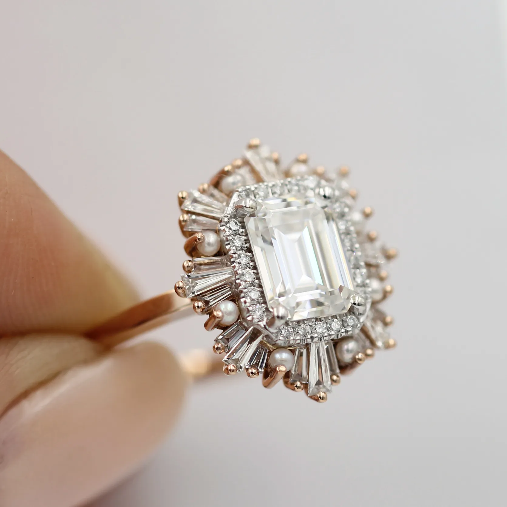 An octagon Gatsby engagement ring in rose and white gold